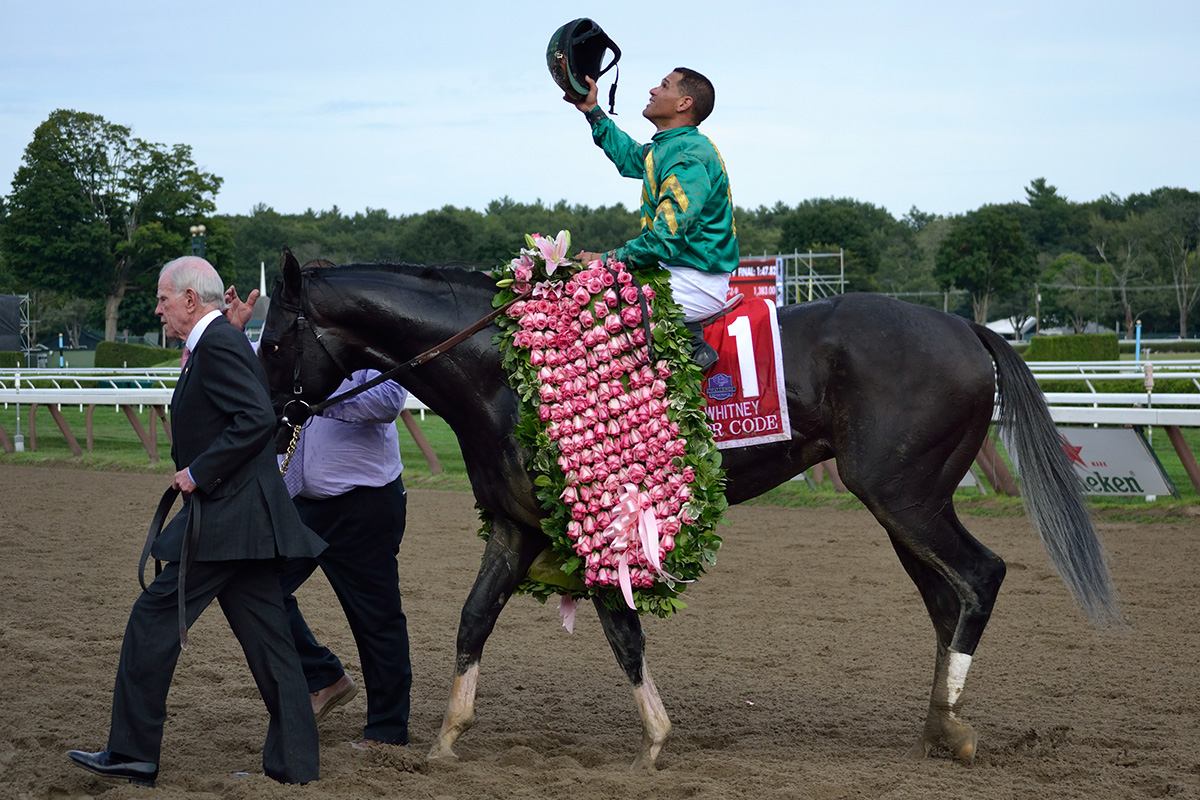 Jockey Javier Castellano gives thanks for the winning the 2015 Whitney with Honor Code