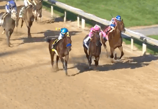 Victor Espinoza whips American Pharoah down the stretch of the 2015 Kentucky Derby